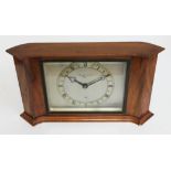 A 1930s Art Deco walnut mantle clock by Elliott, length 33.5cm.