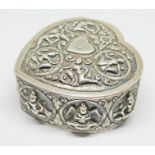 An eastern embossed heart shaped box, length 7.5cm, weight 3oz. Condition - good, general wear