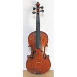 A late 19th century violin by Carlo Storioni, two piece back, length 357mm, interior label dated