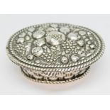 A German silver trinket box modelled as a basket of fruit with gilt interior, length 74mm, weight
