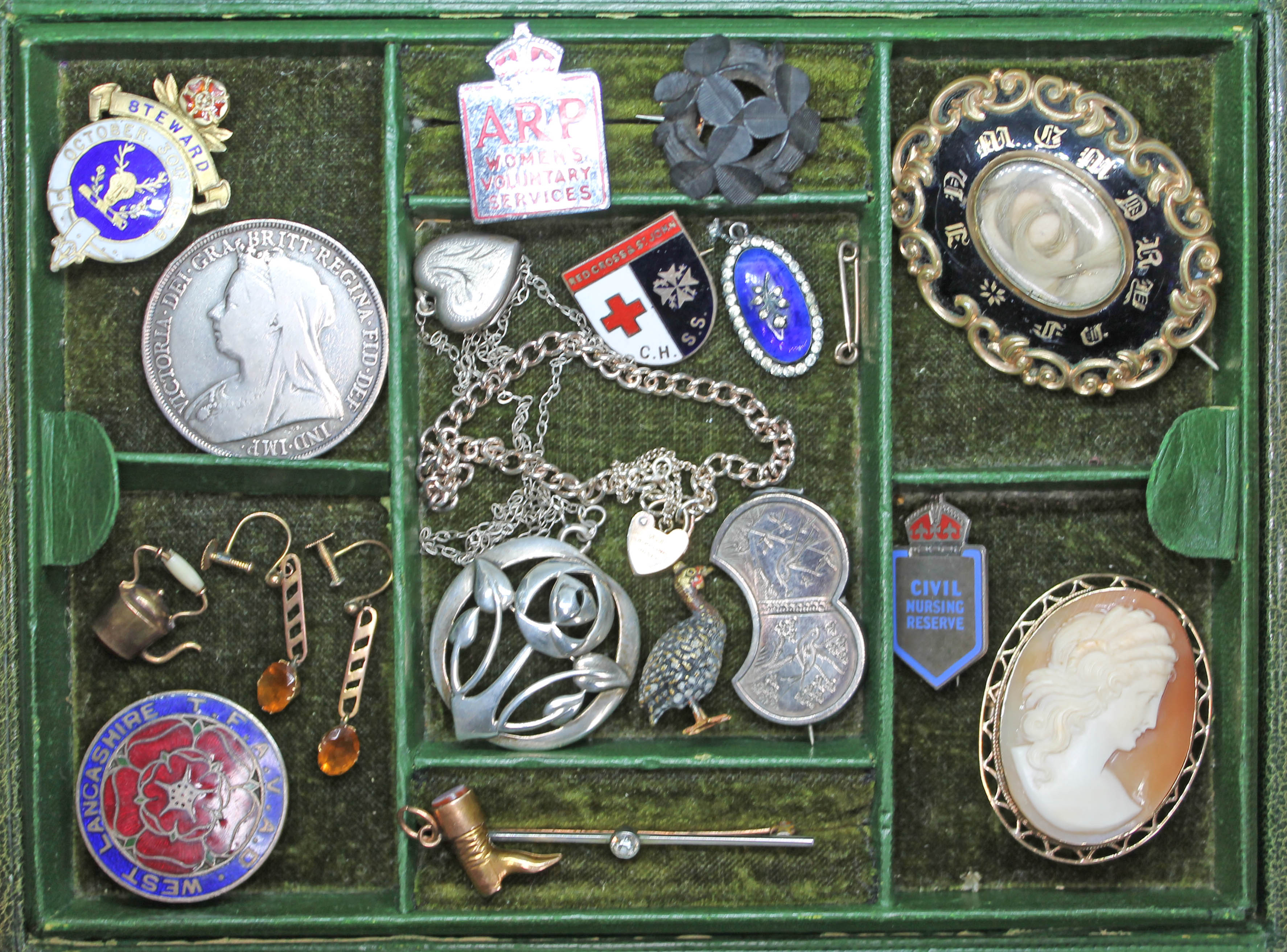 A jewellery box and contents including a yellow metal mounted shell cameo brooch, a pair of earrings