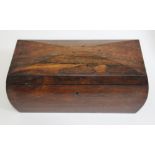 A 19th century rosewood tea caddy of sarcophagus form, length 37cm.