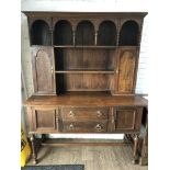 A 19th century oak Shropshire dresser, George Fleet & Co. Cabinet Makers - Stoke, height 200cm,