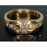 A diamond ring set with seven old cut diamonds (one missing), unmarked, gross wt. 4.23g, size L.