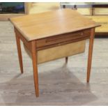 A Danish teak sewing table, width 57cm, depth 47cm & height 51cm.