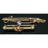 Two bar brooches set with amethyst, one formed as a thistle, both marked '9ct, gross wt. 3.38g,