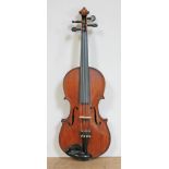 A late 19th century violin, two piece, length 356mm, bearing label 'Joseph Guarnerius 1776', with