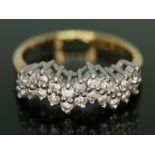 A diamond cluster ring, marked '18ct', gross weight 3.32g, size I.