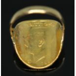 A George V 1912 half sovereign ring, band unmarked, gross wt. 4.28g, size J/K. Condition - a