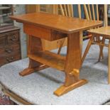 An Alan Grainger "Acornman", azed oak coffee table with drawer and acorn signature.