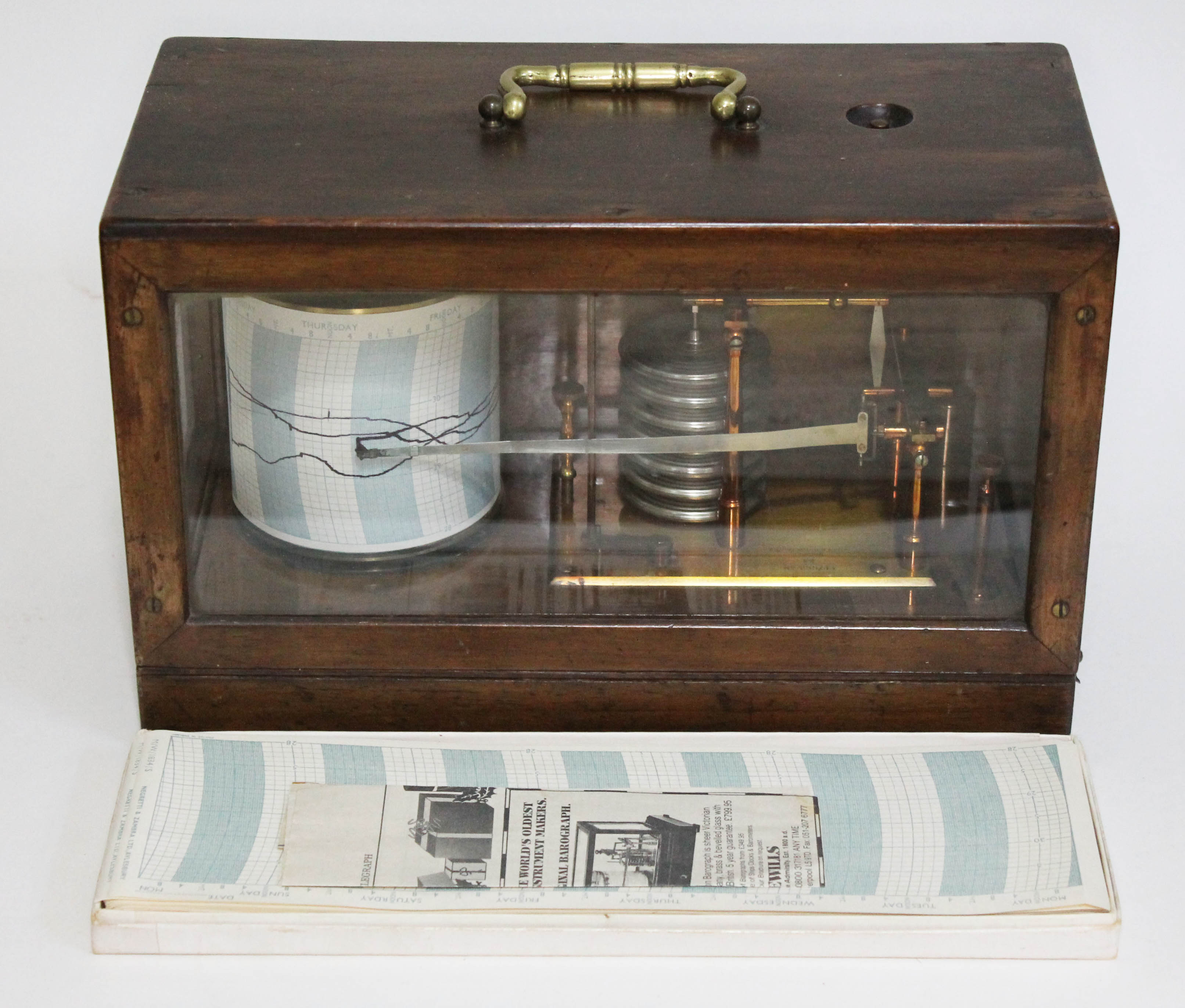 A Wilson Warden & Co, London barograph with Negretti & Zambra recording sheets.