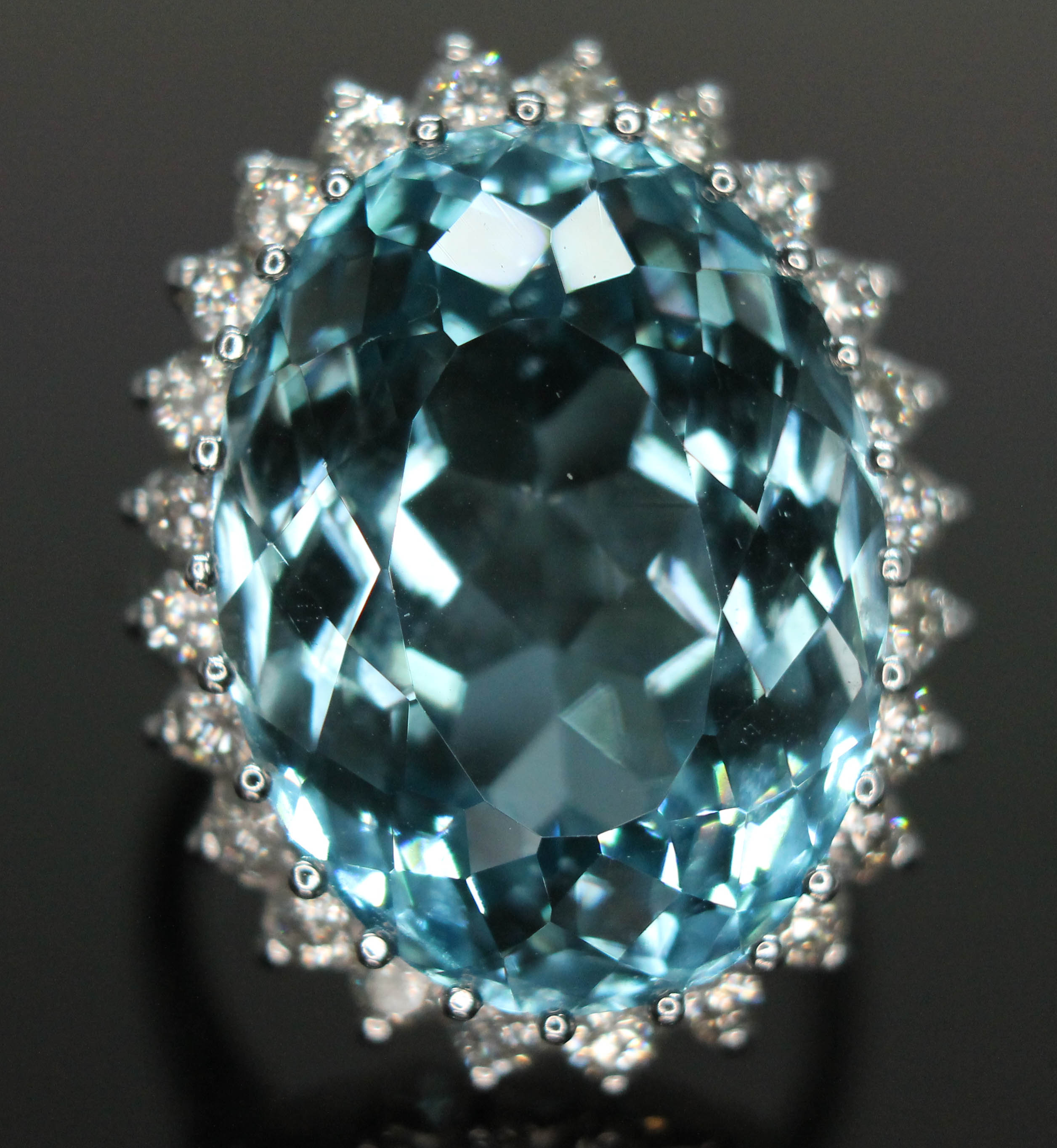 A topaz and diamond cocktail ring, the light to medium oval mixed cut blue topaz weighing approx. - Bild 6 aus 6