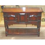 An oak dresser of small proportions in the manner of Titchmarsh & goodwin, width 100cm, depth 32cm &