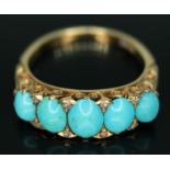 A Victorian turquoise and diamond ring, scroll setting, marked '18c', gross wt. 4.83g, size N.