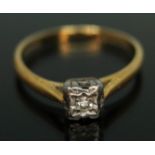 A diamond solitaire ring, marked '18ct & PLAT', gross wt. 2.08g, size K.