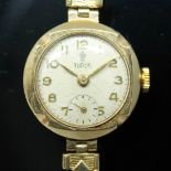 A 1960s hallmarked 9ct gold Rolex Tudor ladies wristwatch having signed champagne dial with Arabic