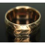 A hallmarked 9ct gold wedding band, wt. 5.77g, size L/M. Condition - good, wear to band exterior.