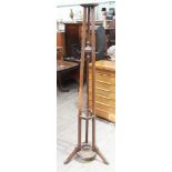 An early 20th century oak hat and coat stand, height 183cm.