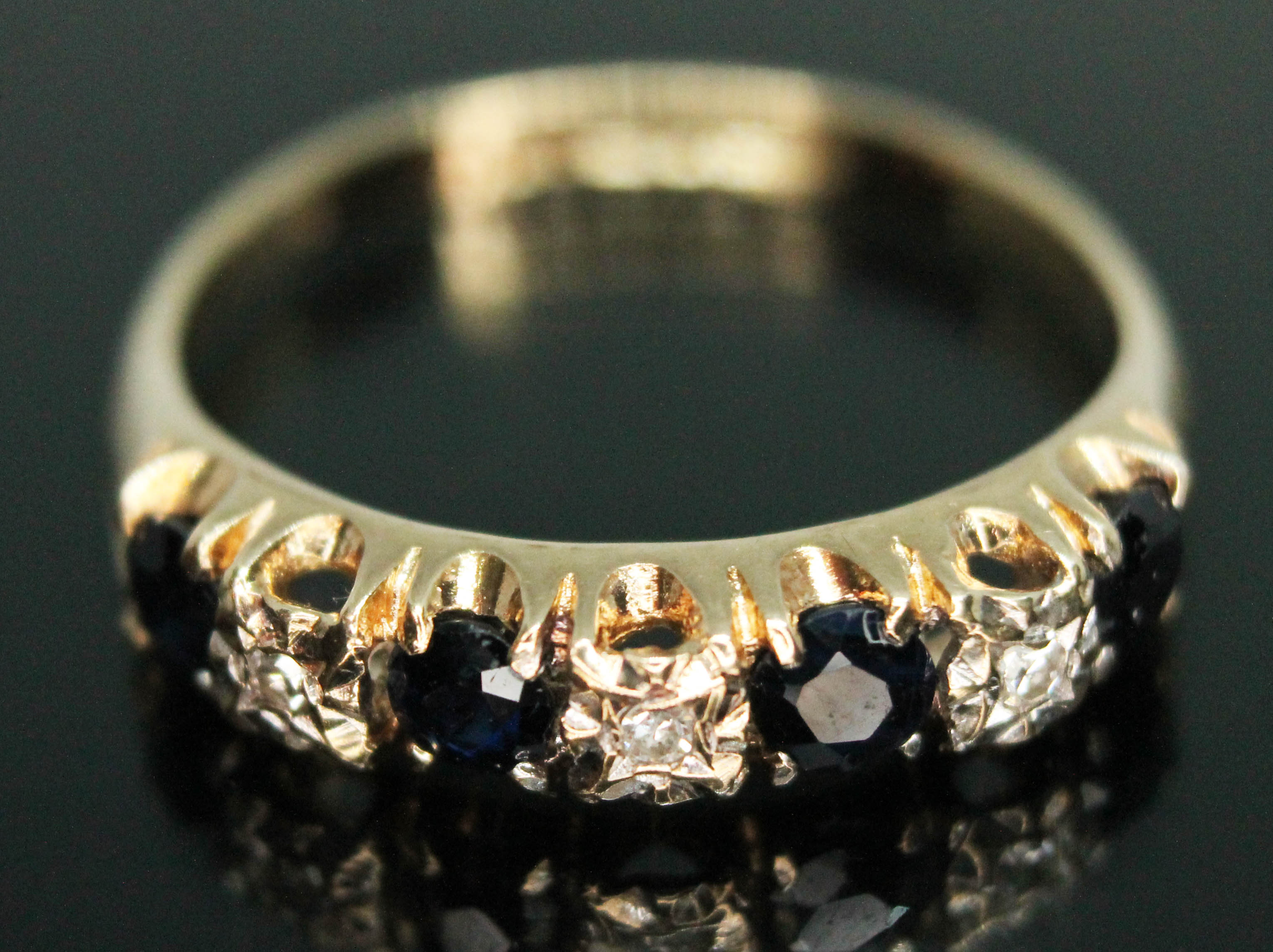 A hallmarked 9ct gold diamond and sapphire ring, gross wt. 2.31g, size P. Condition - good, minor