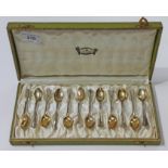 A cased set of twelve German silver gilt teaspoons. Condition - good, general wear only.