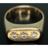 A hallmarked 9ct gold three stone diamond ring, total approx. diamond weight 0.24 carats, gross