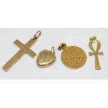 A group of four pendants comprising two hallmarked 9ct gold, another marked '375' and another with