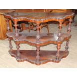 A Victorian rosewood three tier whatnot, length 139cm, depth 46cm & height 96cm.