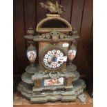 19th century gilt brass mantel clock with painted porcelain panels and wooden base