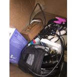 A box of cameras and accessories.
