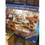 A box of Road Monster die cast toys