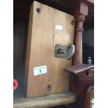A large barn door lock with key