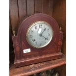 An inlaid mantle clock