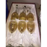 A box of six Italian wine glasses