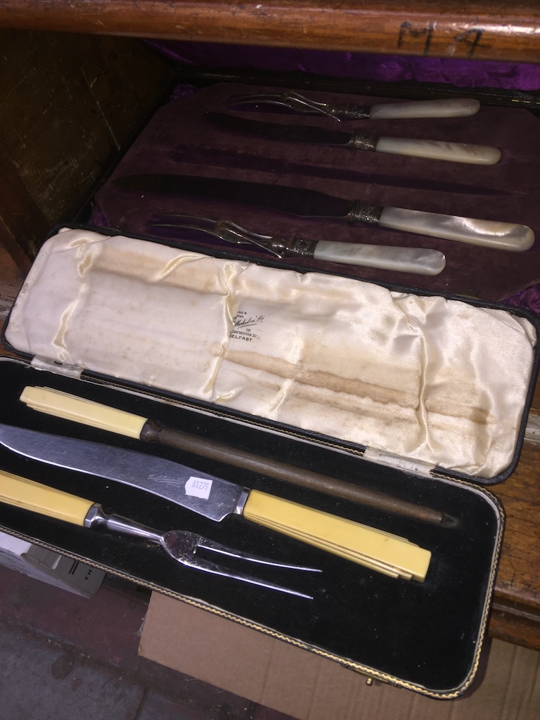 Two cased carving sets including mother of pearl handled