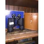 A pair of Denhill DeLuxe binoculars 10X50 in case and with original box.