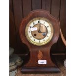 An Edwardian inlaid mantle clock