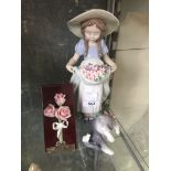 Lladro figure of a girl, Lladro cat and Lladro flower