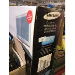Samsung 19" white TV with remote.