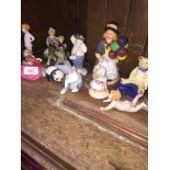 China figures, mainly Royal Doulton and a Lladro cat