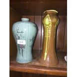 Art Nouveau pottery vase and a green vase