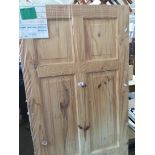 A pair of 6 panelled internal wood doors.