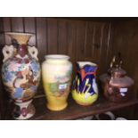 Three pottery vases and a copper kettle