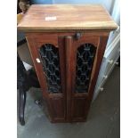 A rustic style hard wood cd cabinet