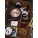 A box of clocks and magnifying glasses.