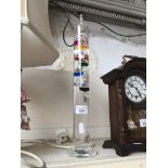 A Galileo thermometer approx 43 cm high