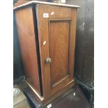 A mahogany pot cupboard