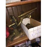 An antique brass microscope and various parts and lenses