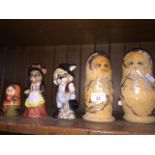 2 vintage '90s graduated gilt wooden matryoshkas, a small hand painted matryoshka and a pair of