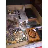A tray of collectables incuding penknives, bank notes, etc