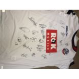 A signed Bolton Wanderers football shirt.